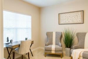 Interior apartment desk area with chairs