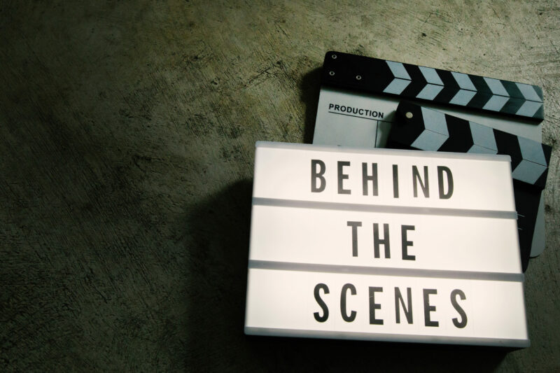 cinema light box reading behind the scenes